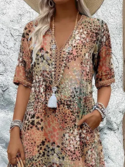 CELESTE – VIBRANT MIDI DRESS WITH POCKETS