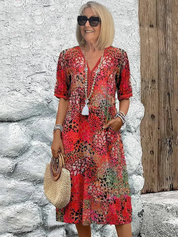 CELESTE – VIBRANT MIDI DRESS WITH POCKETS